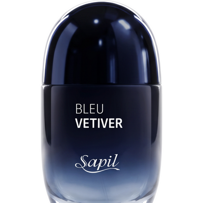 Palette 21 Bleu Vetiver Sapil men's fragrance in a sleek, dark blue gradient glass bottle with a rounded cap.