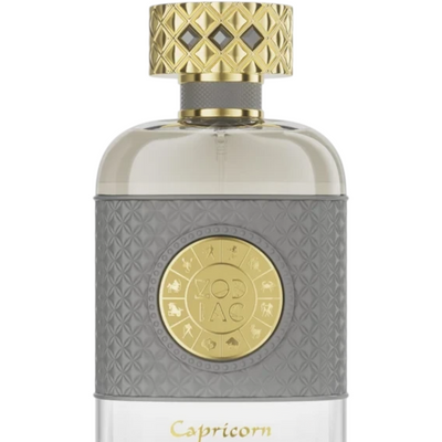 Palette 21 Jo Milano Zodiac Capricorn perfume bottle with a grey textured sleeve and gold zodiac medallion cap.