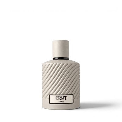 Palette 21 Jo Milano Craft amber spicy unisex Eau de Parfum in a textured beige stone bottle.