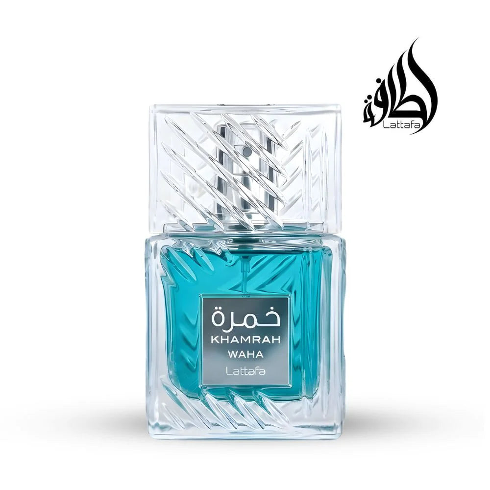 Clear glass perfume bottle with blue liquid labeled 'Khamrah Waha' by Lattafa on a white background.