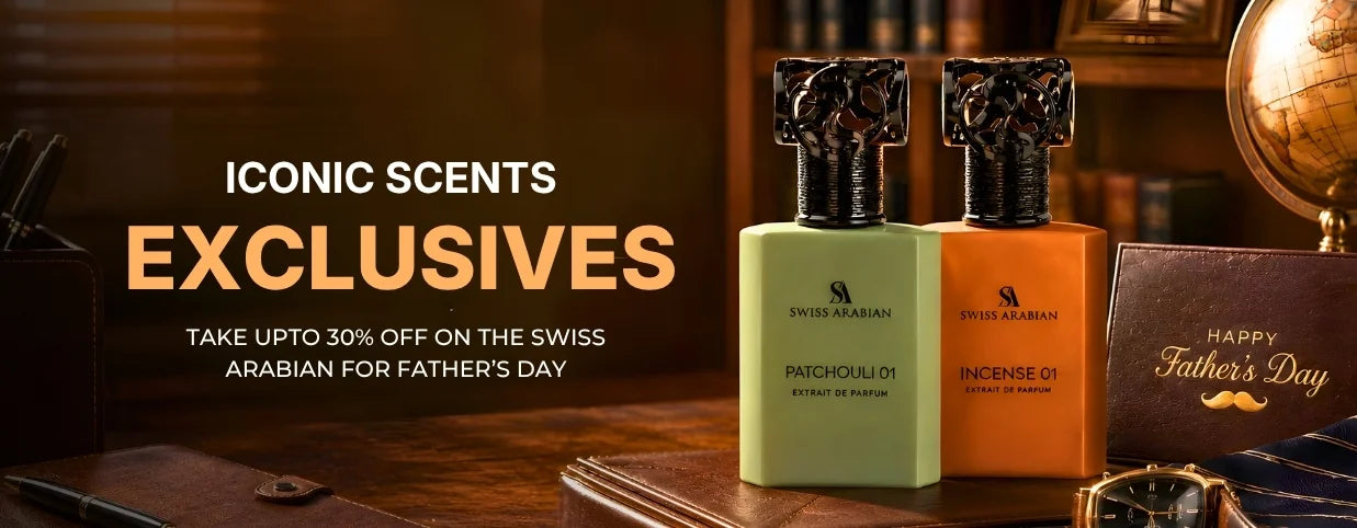 Two bottles of Swiss Arabian perfume on a wooden surface with promotional text for Father's Day.