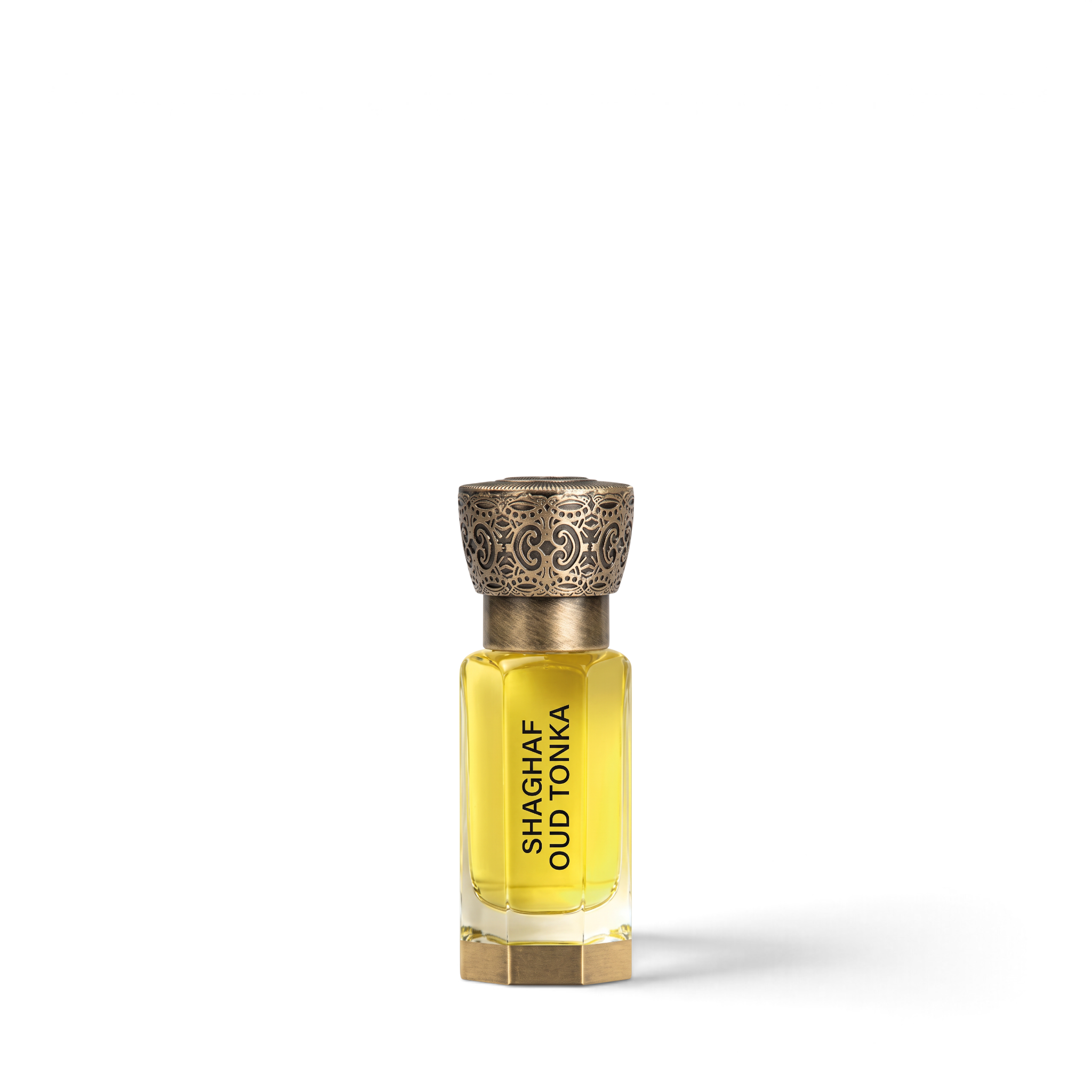 Palette 21 Shaghaf Oud Tonka 12ml concentrated perfume oil in a clear glass bottle with an ornate bronze cap