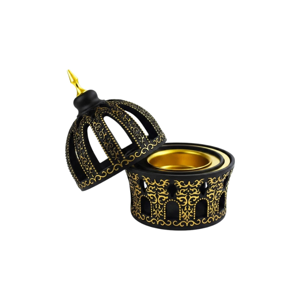Decorative Black and Gold Bakhoor Burner on a white background