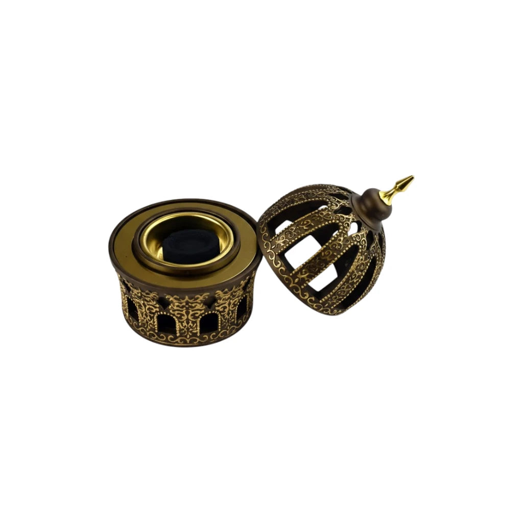 Decorative Golden Bakhoor Burner with intricate design on a white background