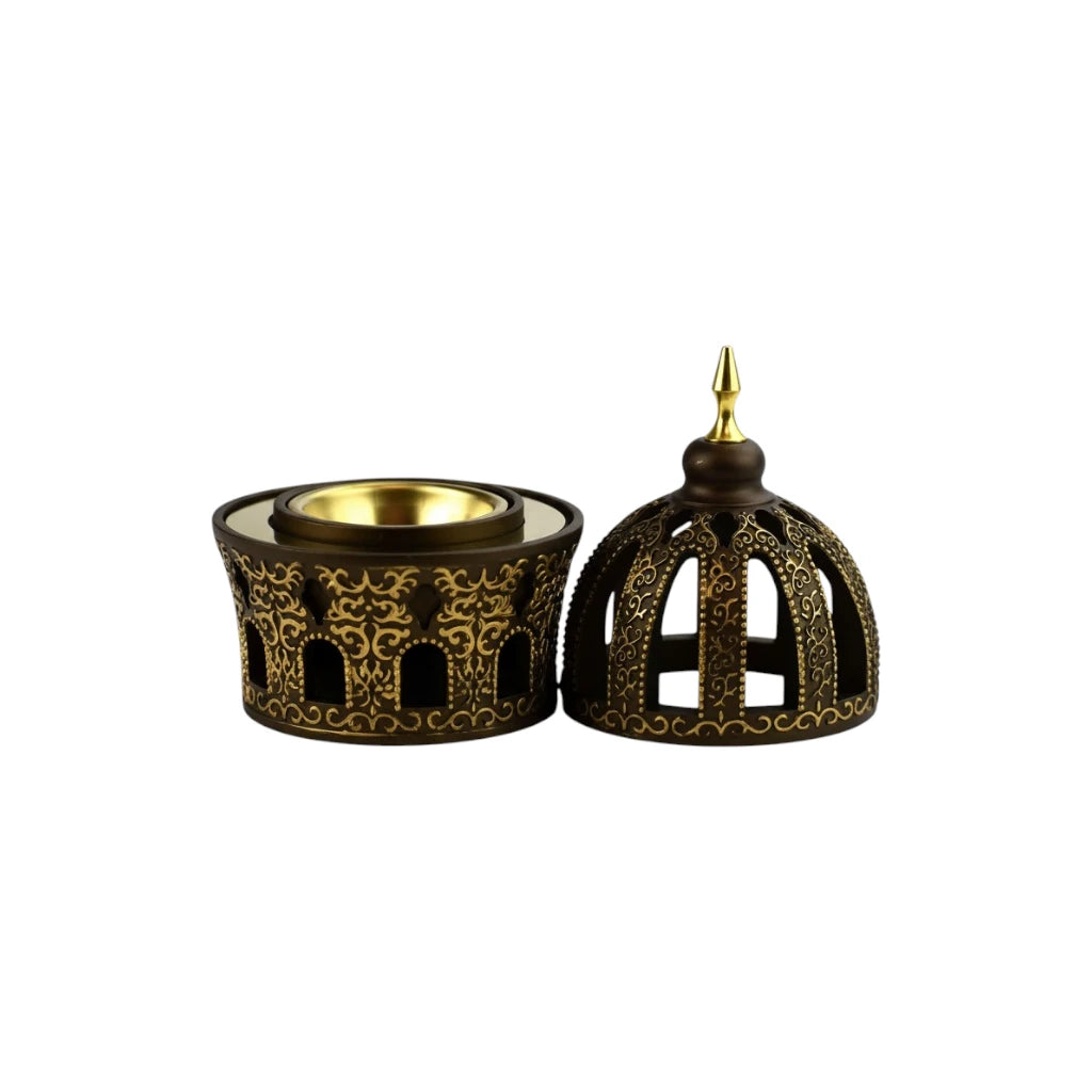 Golden Bakhoor Burner with intricate design on a white background