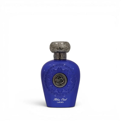 Lattafa Blue Oud with decorative cap on a white background