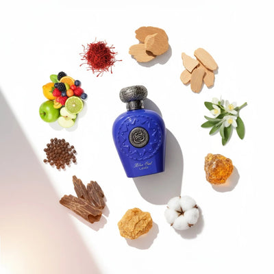 Lattafa Blue Oud surrounded by various ingredients on a white background