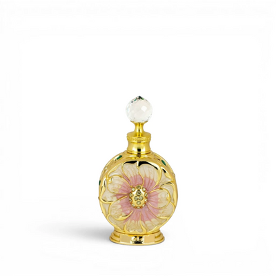 Amaali Perfume Oil perfume bottle with floral design and gold accents on a white background