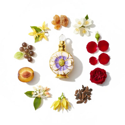  Layali for Women Perfume Oil bottle surrounded by flowers and fruits on a white background