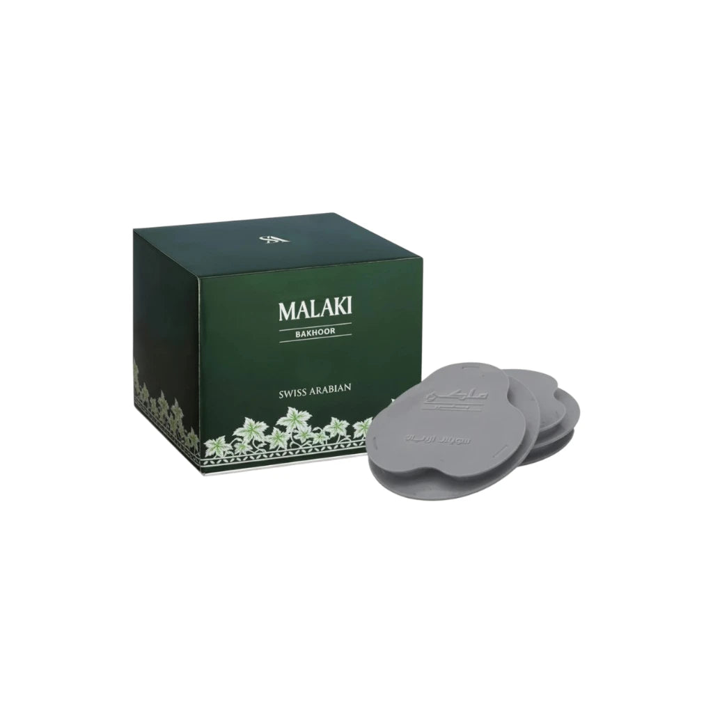 Malaki Bakhoor - 18 premium tablets packaging with three tablets on a white background