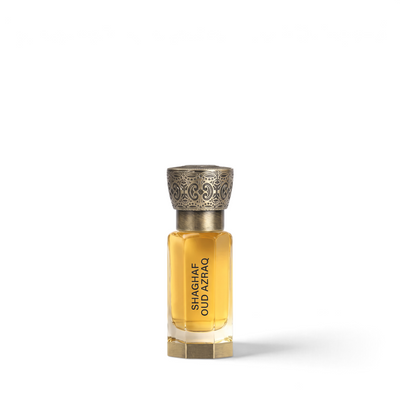 Palette 21 Shaghaf Oud Azraq concentrated perfume oil in a rectangular glass bottle with an ornate bronze cap