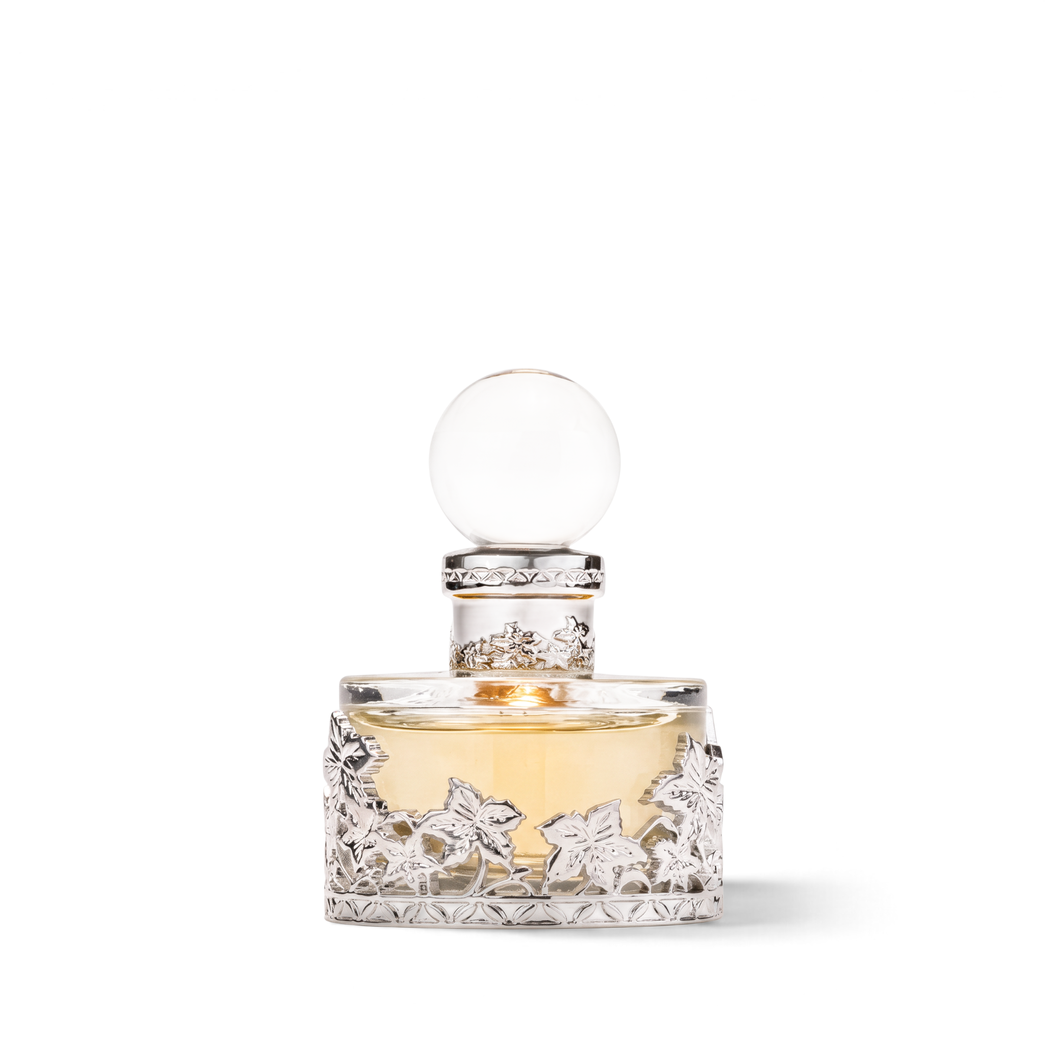 Palette 21 Musk Malaki 207 perfume oil in a decorative glass bottle with intricate silver floral filigree overlay