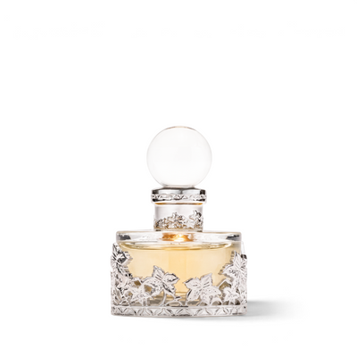 Palette 21 Musk Malaki 207 perfume oil in a decorative glass bottle with intricate silver floral filigree overlay