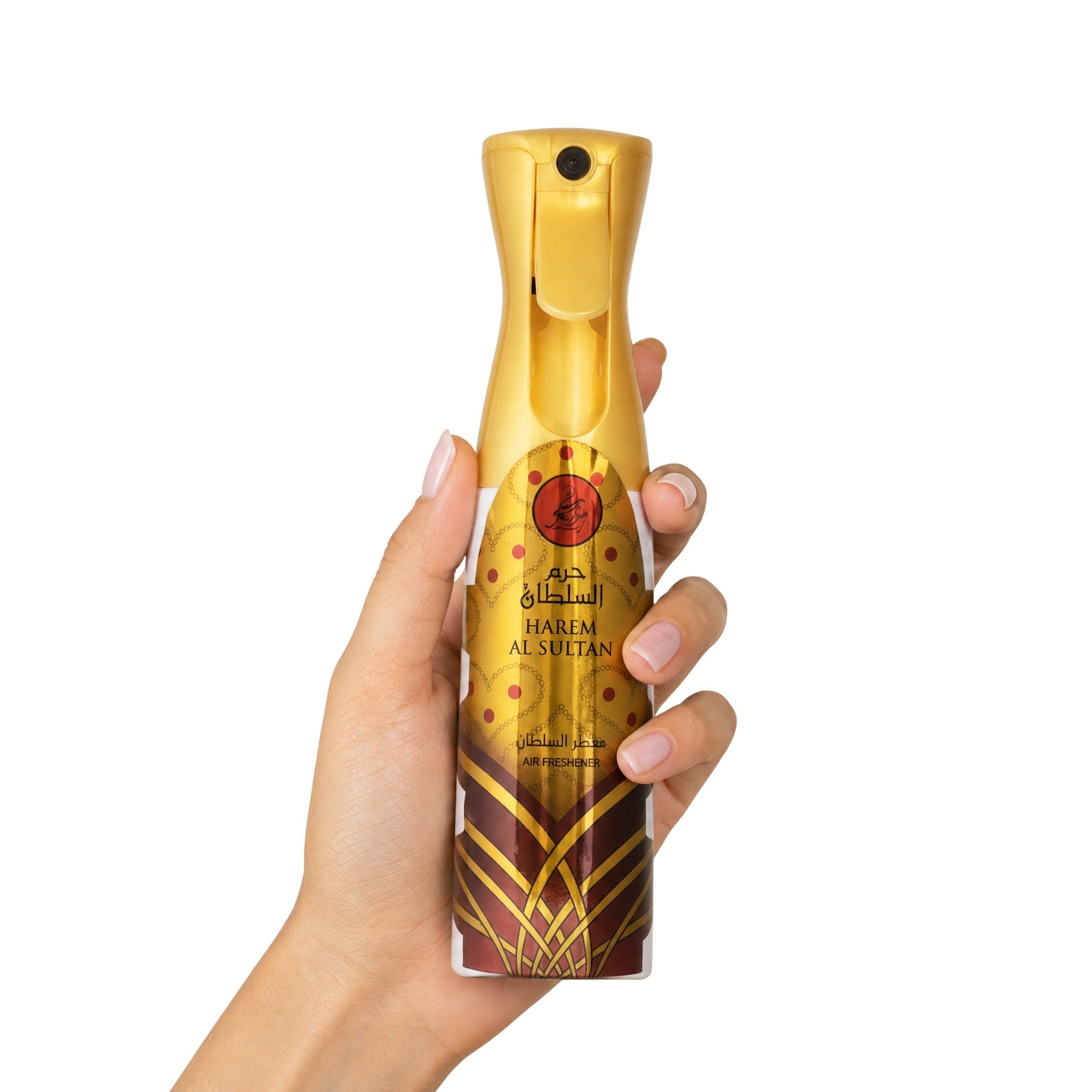 Hand holding the Khadlaj Hareem Al Sultan Gold Arabian air freshener can