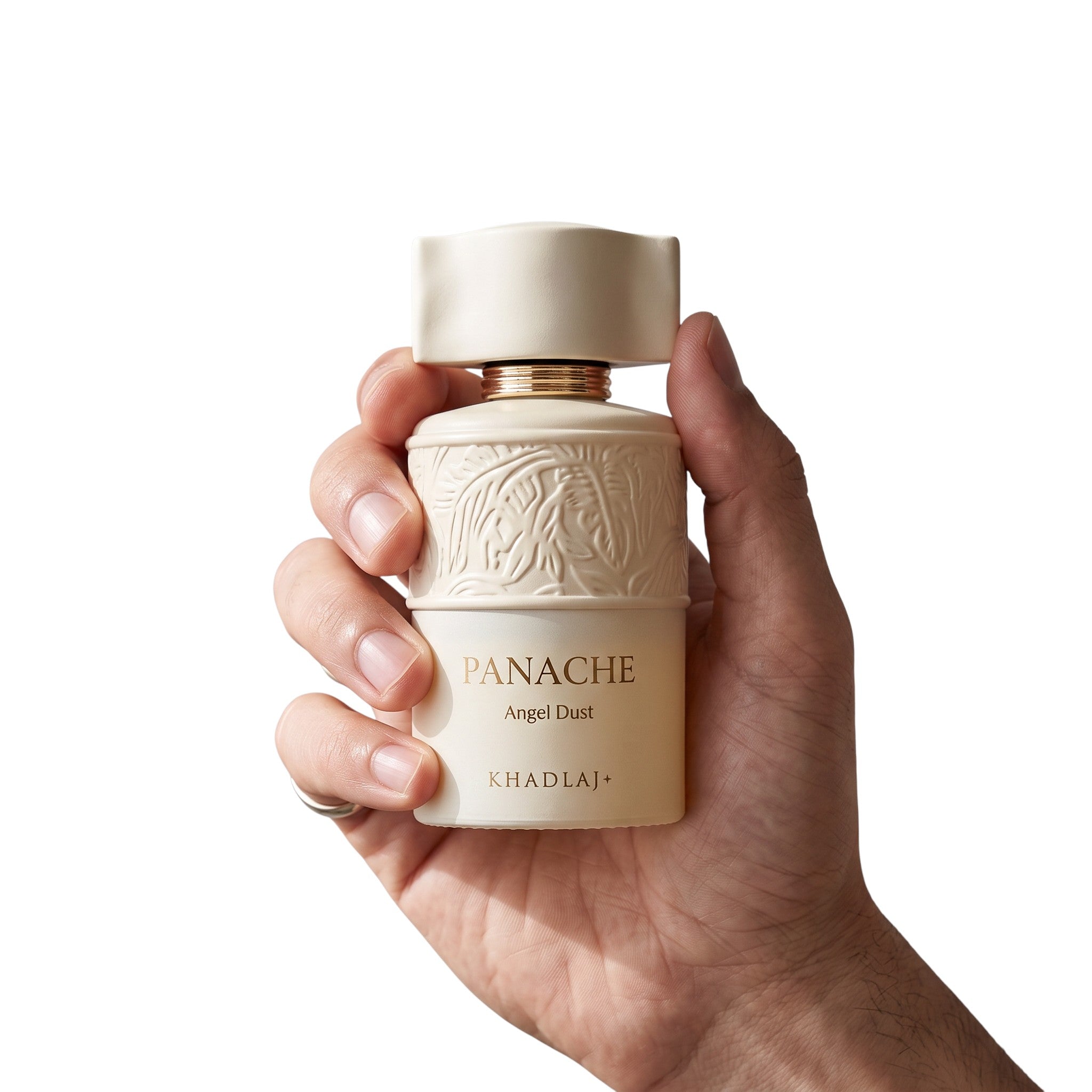 Hand holding the Khadlaj Panache Angel Dust sweet gourmand perfume for women