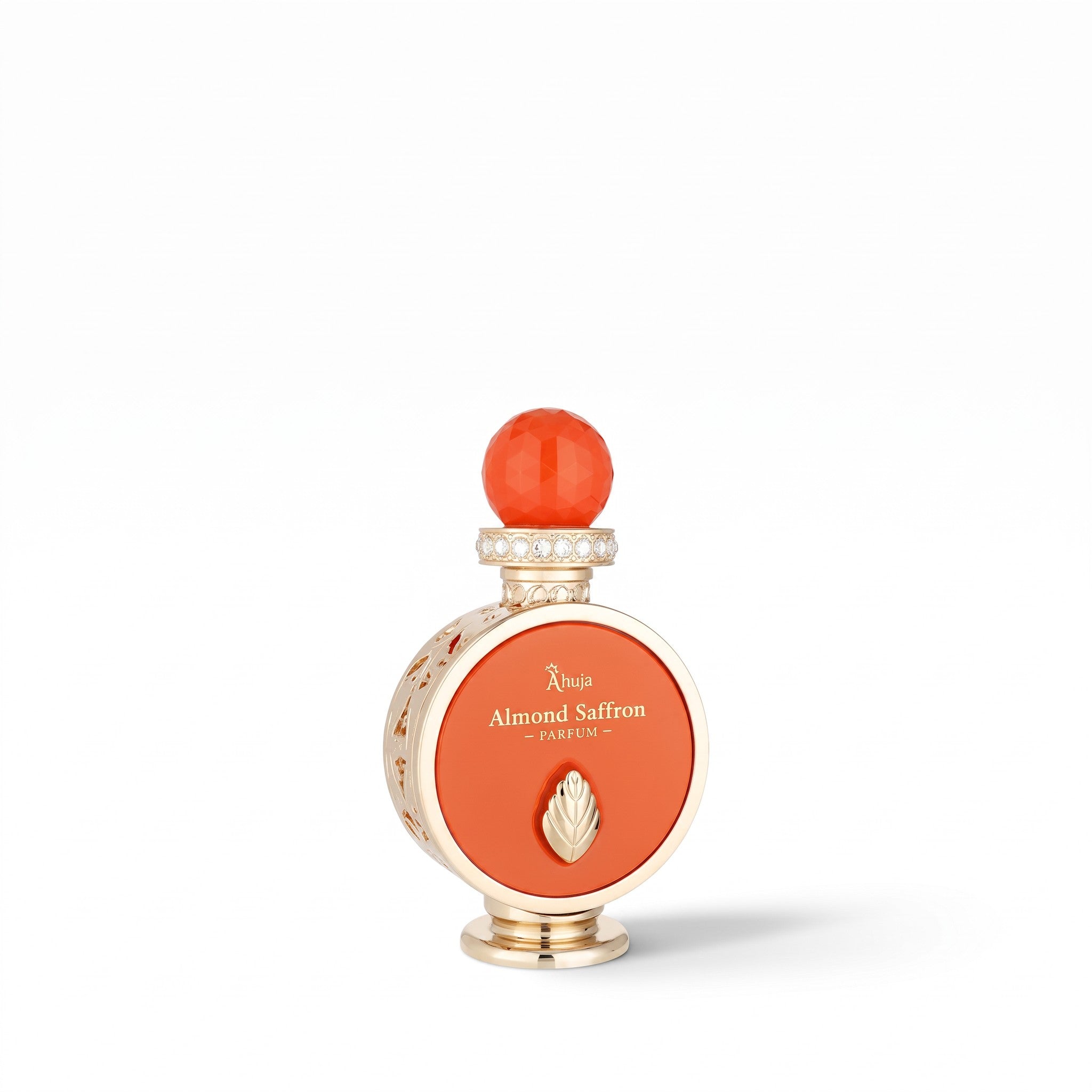 Palette 21 Ahuja Almond Saffron parfum bottle in vibrant orange with gold accents and a crystal-adorned cap.
