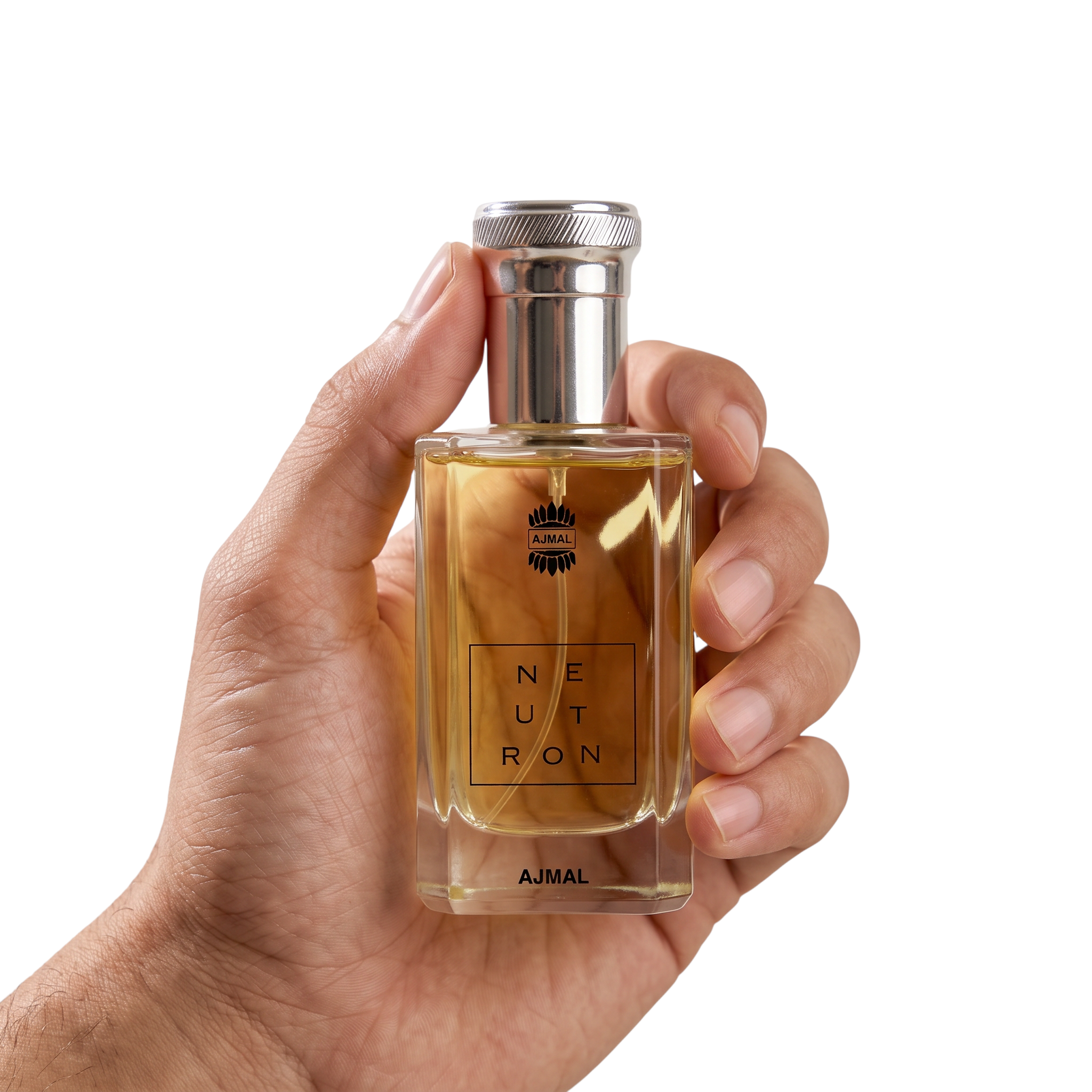 Palette 21 AJMAL Neutron Eau de Parfum in a clear glass bottle with a silver cap held in a hand