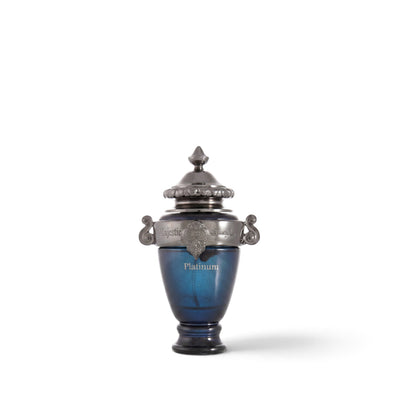 Palette 21 Arabian Oud Majestic Platinum unisex perfume in a deep blue glass bottle with an ornate metallic cap.