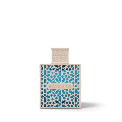 Palette 21 Azul Rayhaan for men fragrance in a blue glass bottle with an intricate beige geometric lattice overlay.
