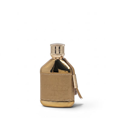 Palette 21 Dumont Nitro Gold perfume bottle in metallic gold with brown leather wrap and engraved branding.