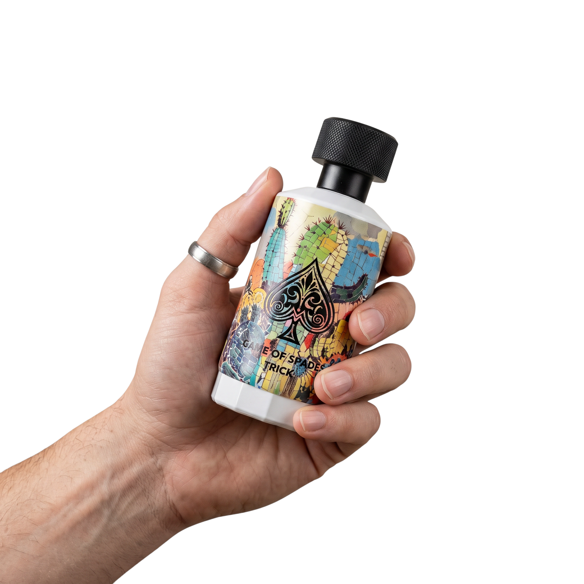 Palette 21 Jo Milano Game of Spades Trick eau de parfum bottle with mosaic design held in a hand