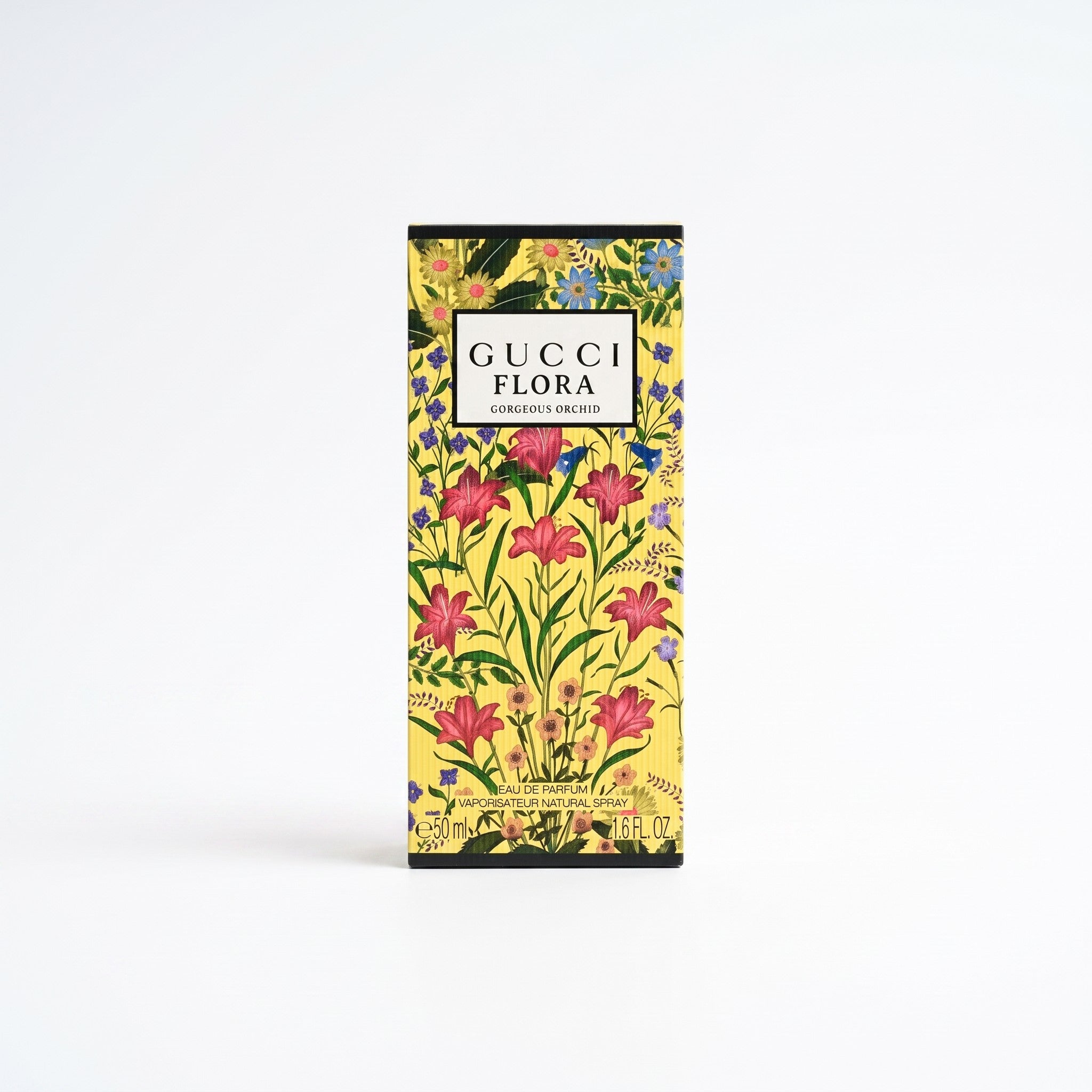 Palette 21 Gucci Flora Gorgeous Orchid eau de parfum bottle in a vibrant yellow box with floral botanical print