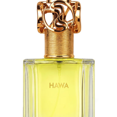 Palette 21 HAWA Swiss Arabian perfume in a clear glass bottle with a decorative gold cap and yellow fragrance liquid.