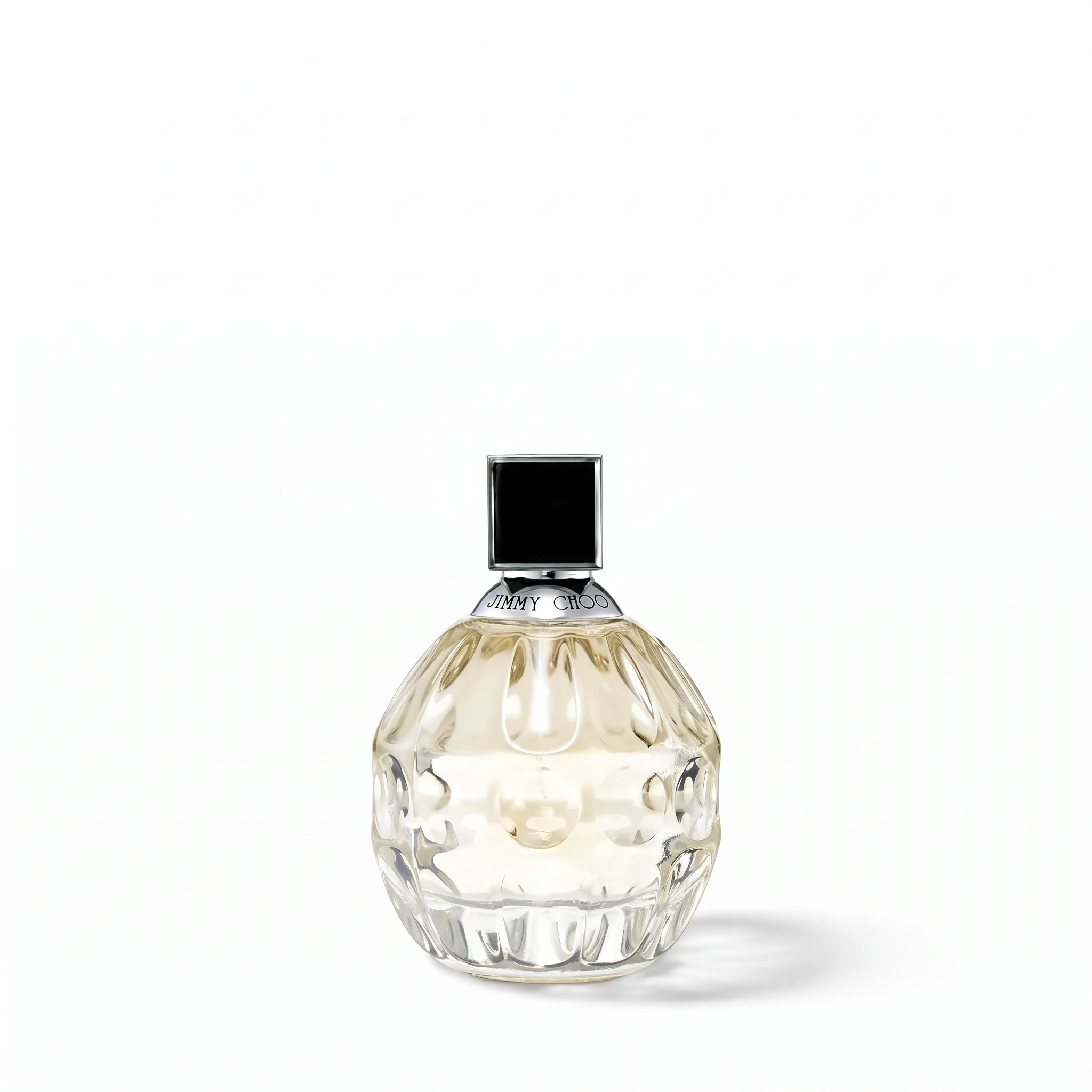 Palette 21 Jimmy Choo Eau de Parfum in a round, textured glass bottle with a black cap against a white background.