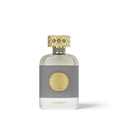 Palette 21 Jo Milano Paris Zodiac Capricorn perfume bottle with a grey textured sleeve and gold zodiac medallion cap.