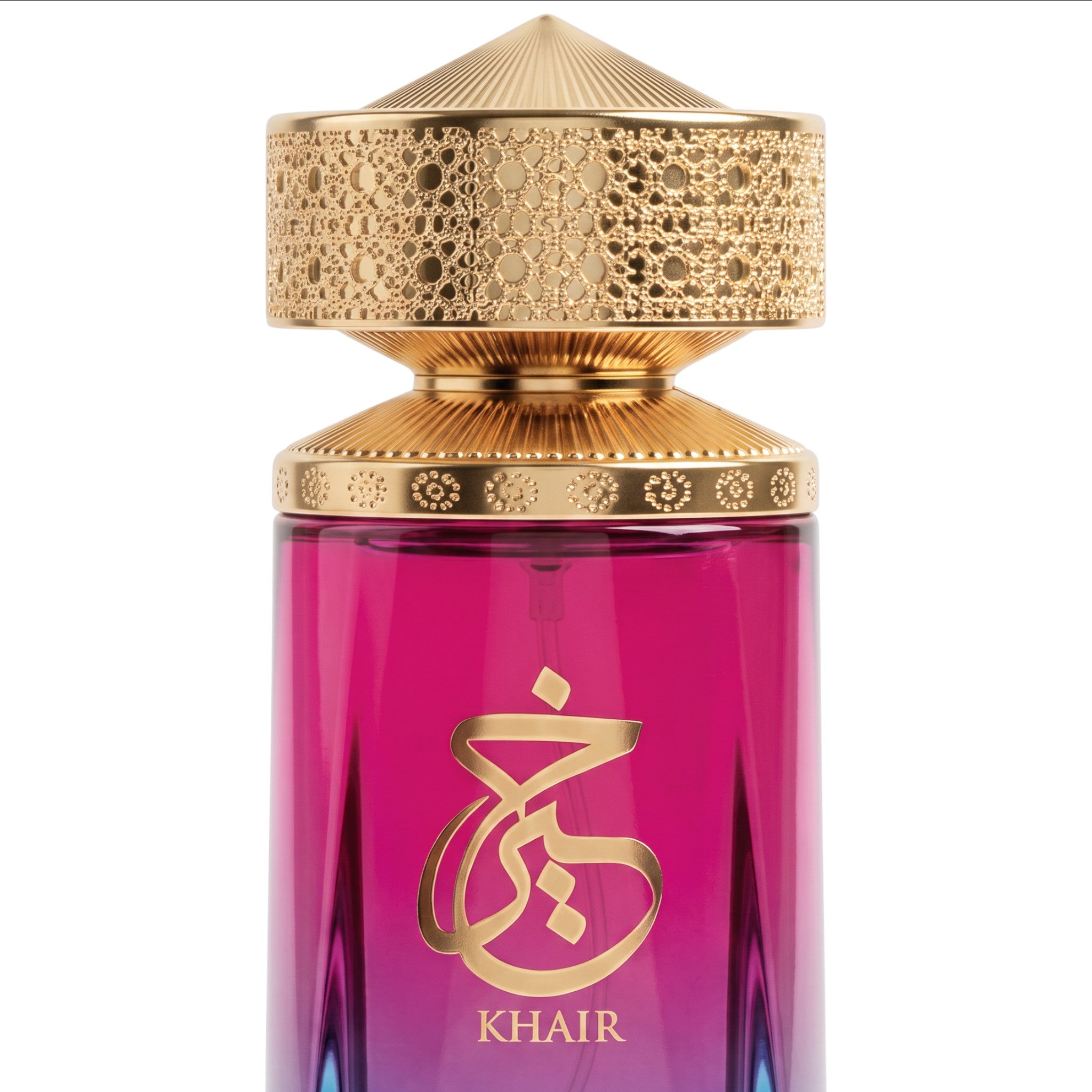 Palette 21 Khair Confection Eau de Parfum in a magenta to blue gradient glass bottle with an ornate gold cap.