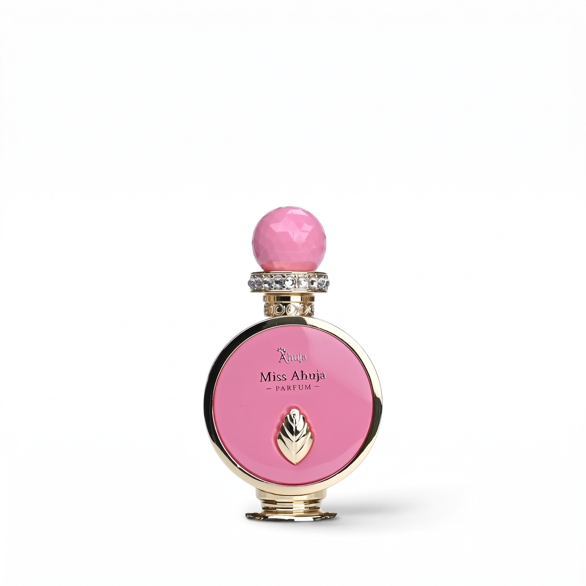 Palette 21 Miss Ahuja parfum bottle in circular pink with gold accents, crystal collar, and faceted pink cap.