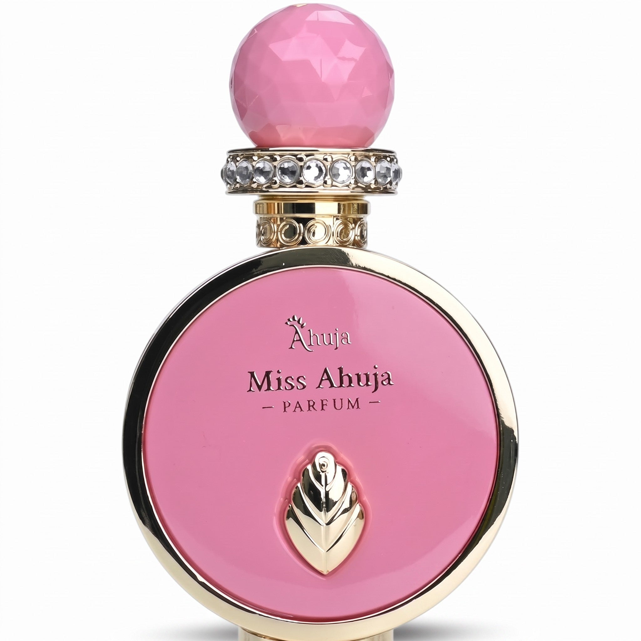 Palette 21 Miss Ahuja parfum bottle in circular pink with gold trim, crystal collar, and faceted pink cap.