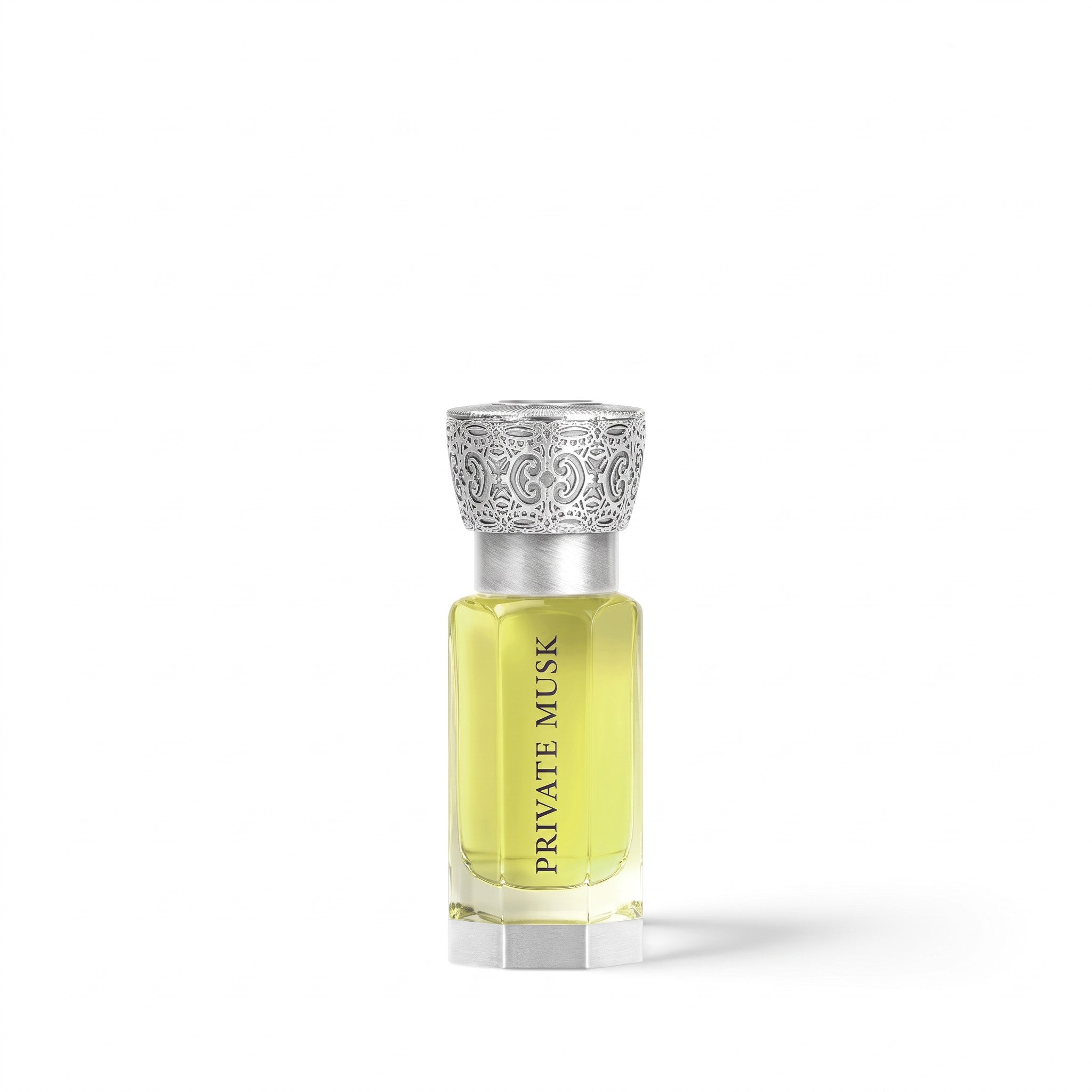 Palette 21 Private Musk Swiss Arabian perfume in a clear glass bottle with an ornate silver cap