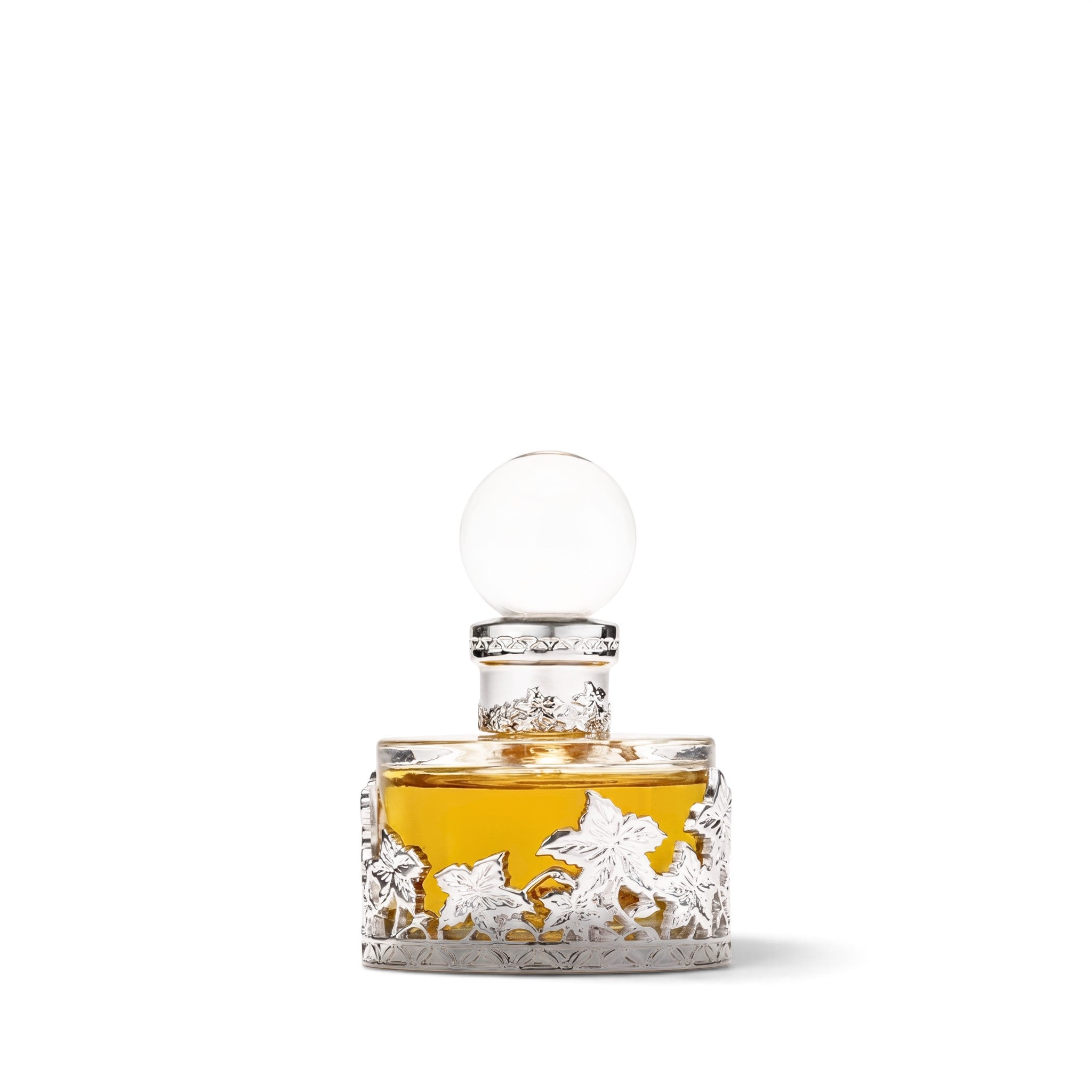 Palette 21 SWISS ARABIAN Rose Malaki perfume oil in an ornate glass bottle with silver leaf metalwork and round topper