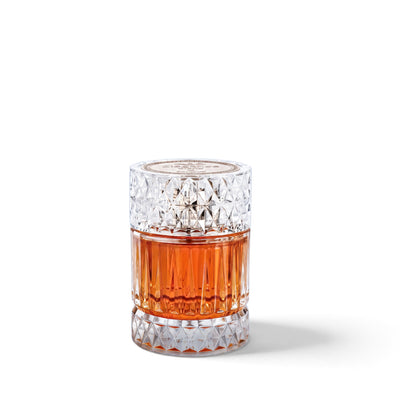 Palette 21 Sharaf Blend Zimaya Extrait de Parfum in a faceted glass bottle with amber liquid and a textured cap.