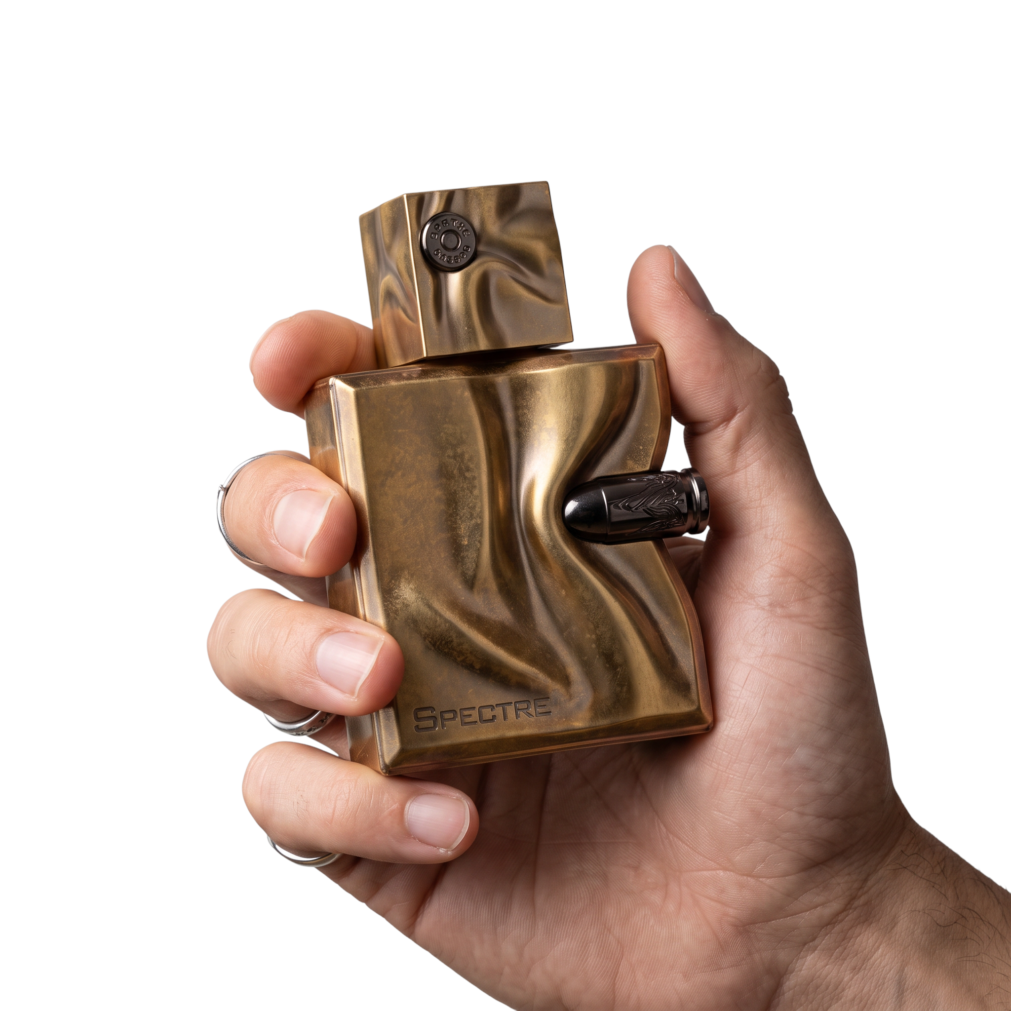 Palette 21 Spectre Eau De Parfum in a sculptural metallic bronze bottle held in a hand against a white background.