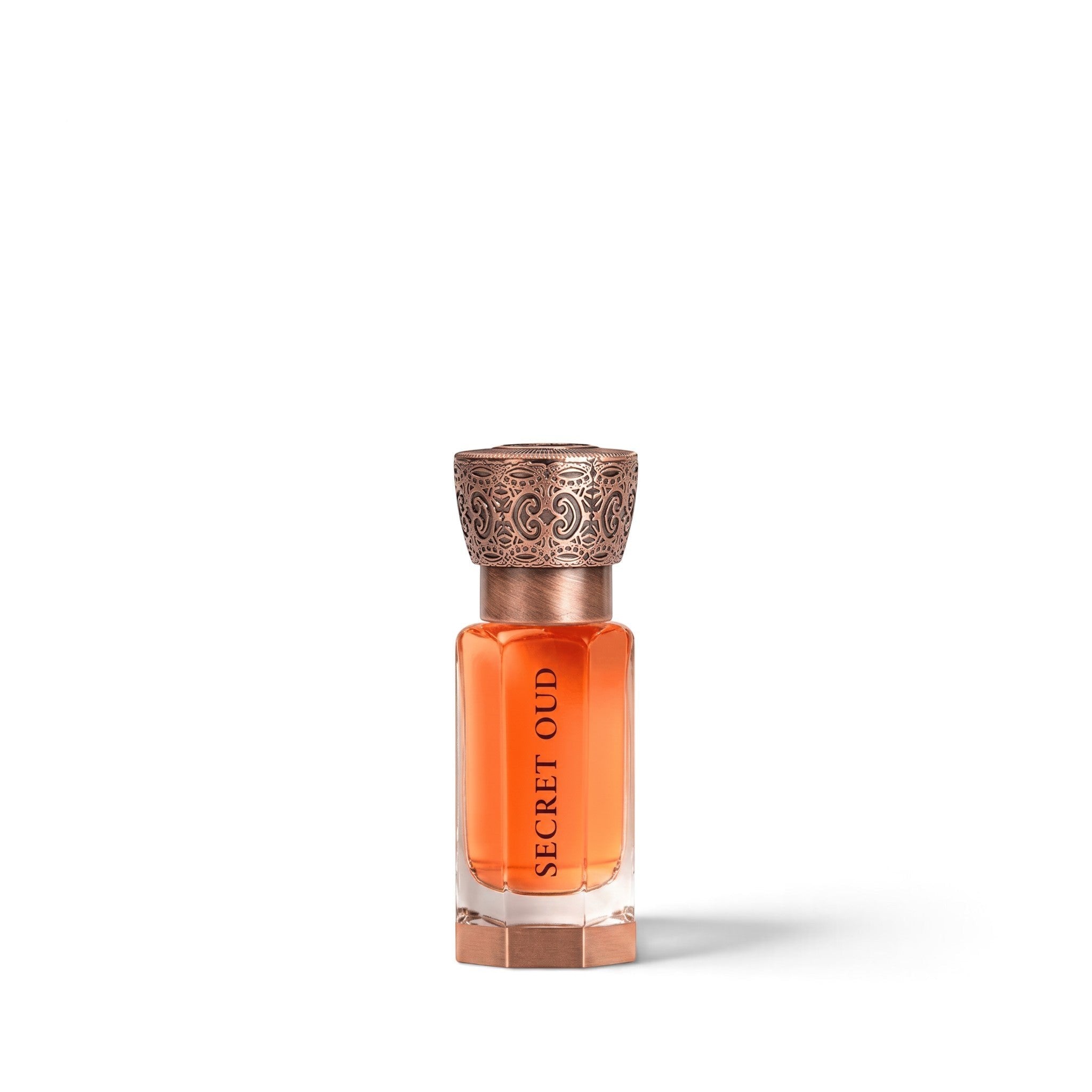 Palette 21 SWISS ARABIAN Secret Oud concentrated perfume oil in a glass bottle with an ornate metallic copper cap