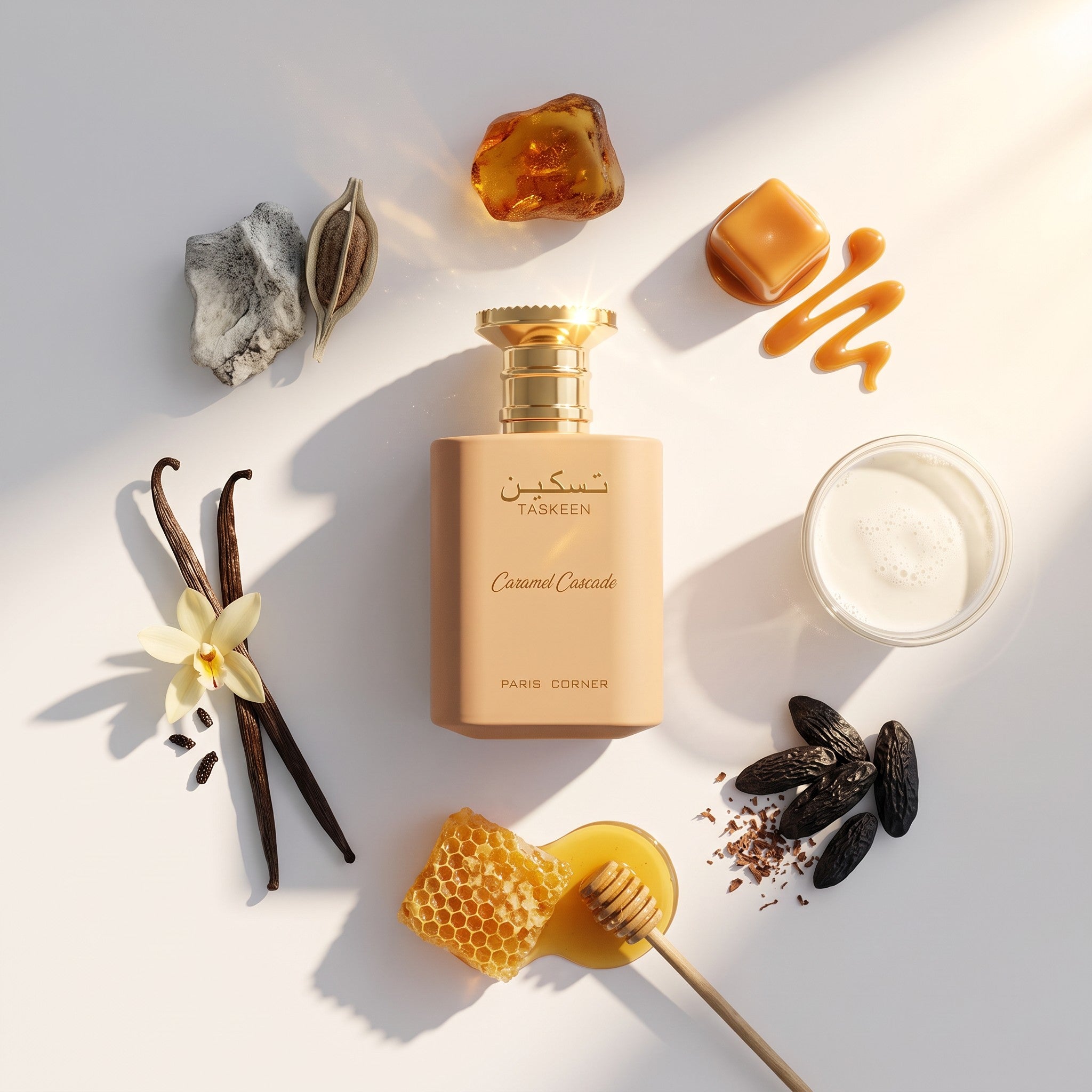 Palette 21 Paris Corner Taskeen Caramel Cascade perfume bottle surrounded by vanilla, honey, and caramel ingredients.