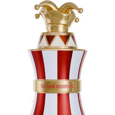 Palette 21 Paris Corner The Show Magnifique perfume bottle with a gold jester cap and red and white striped design.
