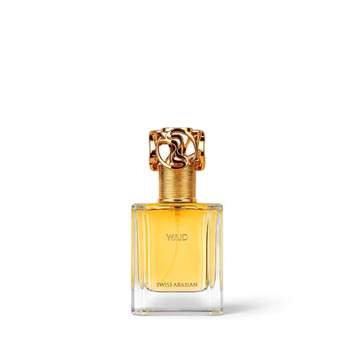 Palette 21 WAJD Swiss Arabian perfume in a clear glass bottle with a decorative gold cap on a white background